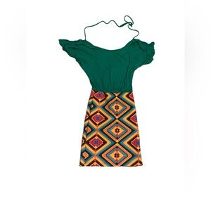 Dress. Green top with attached patterned skirt. Size medium